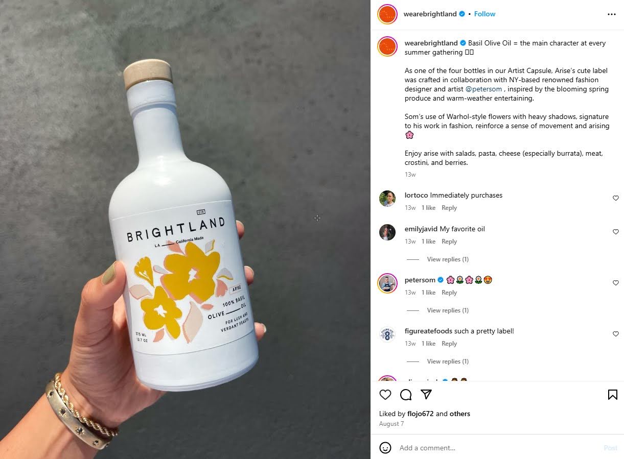 Brightland highlights an artist-designed label in this product photo of the brand's Basil Olive Oil.
