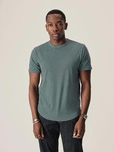 Model in Slate Blue Venice Wash Pima Curved Hem Tee - 1