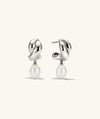 Brioche Pearl Drop Earring featuring a knot design with a moving pearl charm, combining elegance with wearability.