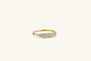 Pavé Diamond Slim Signet: A gold ring featuring a sleek signet design adorned with pavé diamonds, offering a subtle yet stunning sparkle.