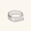 Slim Rectangular Signet Ring featuring a bold, hexagon-shaped silver design with a square band, perfect for a striking fashion statement.