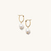 Organic Pearl Hoops: Handcrafted gold vermeil earrings featuring unique freshwater pearls, showcasing minimalistic elegance and individual beauty.