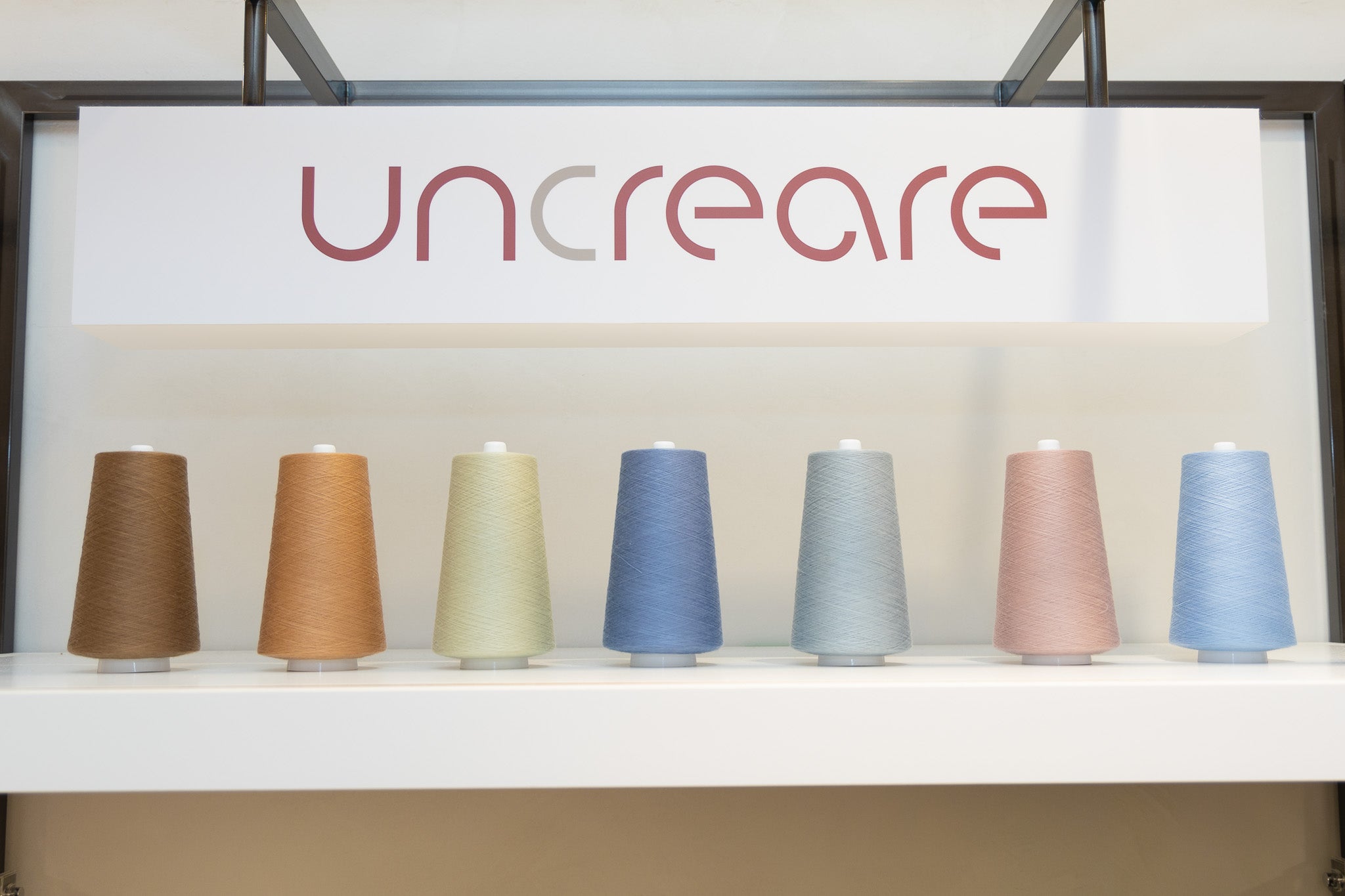 「uncreare」のブランドロゴ