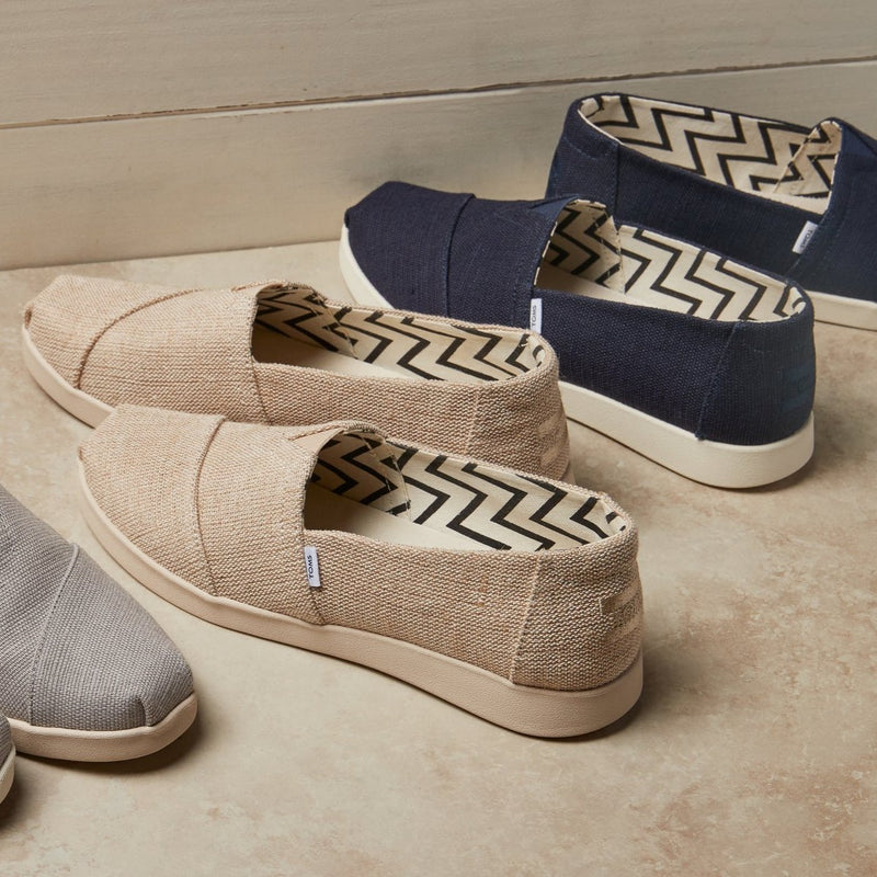 Laydown image of the natural undyed Alpargata Plus slip on