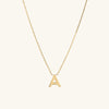 Gold Letter Necklace with a pendant on a delicate chain, perfect for personalized fashion.