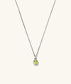 Sia Birthstone Pendant Necklace featuring a small green gemstone on a silver chain, perfect for personal or gift use.