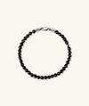 4mm Gemstone Beaded Bracelet with black beads and a sterling silver swivel clasp, offering a handcrafted touch to your everyday style.