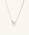 Linked Pavé Diamond Pearl Necklace featuring interlinked rings in 14k gold with diamonds and mother of pearl, symbolizing strong personal bonds.