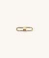 Mejuri Custom Chain Enhancer featuring a gold metal clasp with a black center, and a gold chain with several rings.