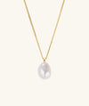 Bold Pearl Pendant Necklace featuring a freshwater pearl on an 18k gold vermeil chain, designed for stacking and making a statement.