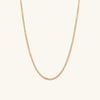 Flat Curb Chain Necklace: A sleek gold chain with a minimalist design, perfect for everyday wear and elevating any outfit.