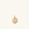 Pave Diamond Bail Round Tag Charm Pendant featuring a 14k gold disc with a central diamond, ideal for personalization and versatile wear.
