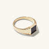 Black Onyx Square Signet Ring: A gold ring featuring a striking black onyx stone, perfect as a bold fashion accessory.
