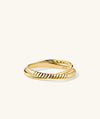 Duo Ring: Handcrafted 14k gold ring with a twisted band design, featuring two thicker bands that move effortlessly together.