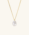 Bold Pearl Pendant Necklace featuring a freshwater pearl on an 18k gold vermeil chain, designed for stacking and making a statement.