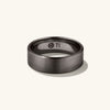 6mm Smooth Band: close-up of a black ring with the letter 'M' engraved, showcasing its lightweight and lasting design, perfect for your next chapter.
