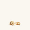 Dôme Huggies: Lobe-hugging, sculptural gold earrings with a rounded vault, perfect for stacking and everyday wear, from the iconic Mejuri Dôme collection.